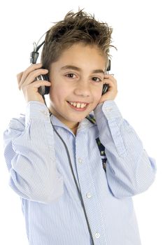 a boy listining to music with a headphone