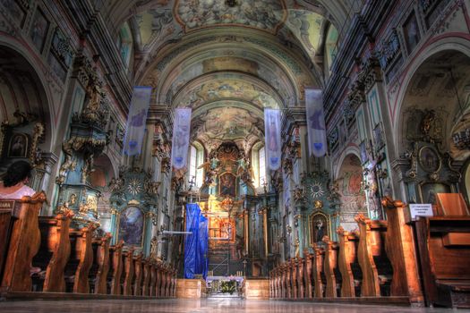 Colourful baroque interior of a Fransiscan church in Przemysl