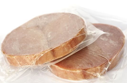 Vacum sealed single servings of frozen tuna