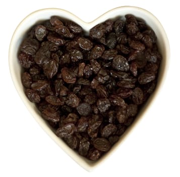 Heart filled with sweet raisins, with clipping path