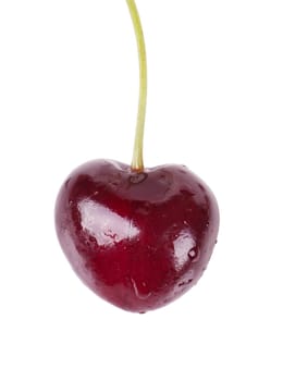 Close up view of heart shaped cherry isolated over white background