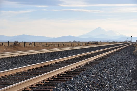 Railroad tracks with Mt. Shasta in Northern California 