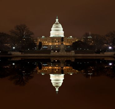 United States Capitol Building at night in Washington DC