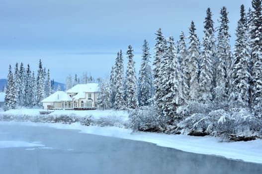 House on an Alaska River in Winter  