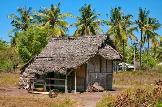 Rural abandoned hut in an indonesia tropical settlement