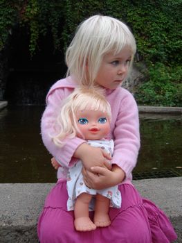 little girl with her doll