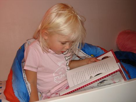 little girl reading