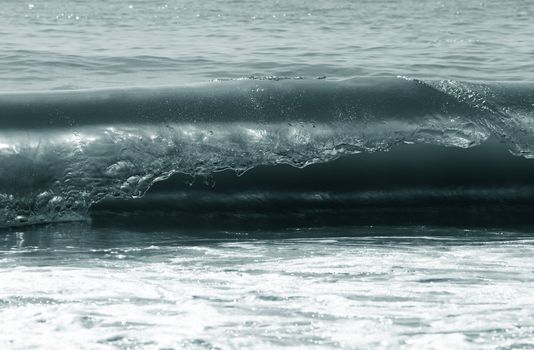 Big wave crashes on to the shore