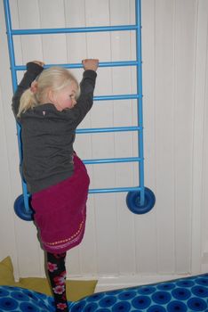 girl climbing the ladder