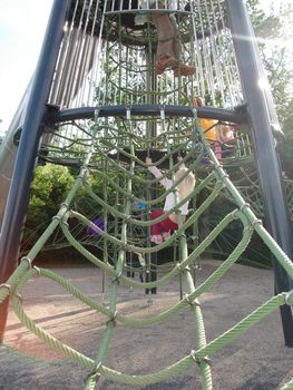 children climbing the nets