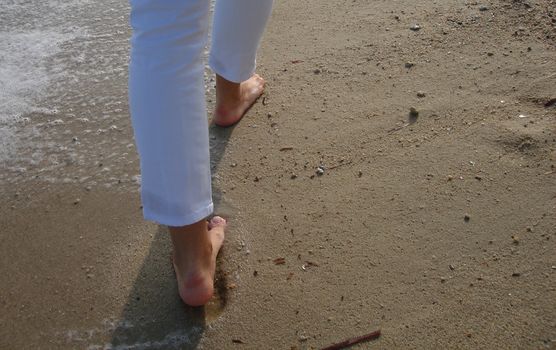 woman walking on the beach