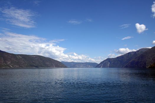 beautiful norwegian fjords with a clear blue sky