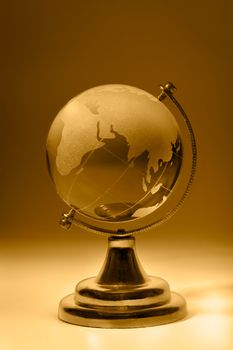 Crystal glass globe orange tinted