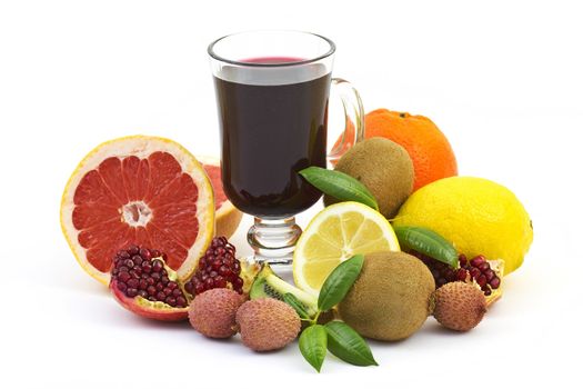 Collection of a ripe tropical fruits and pomegranate juice