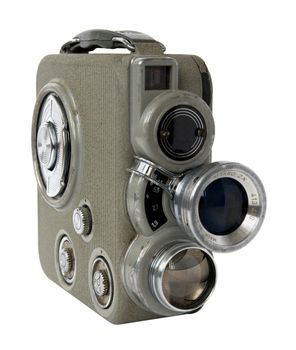 old 8mm movie camera on white background