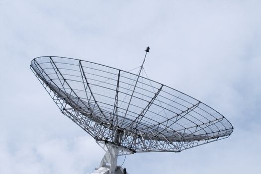 Communication radar on a cloudy sky