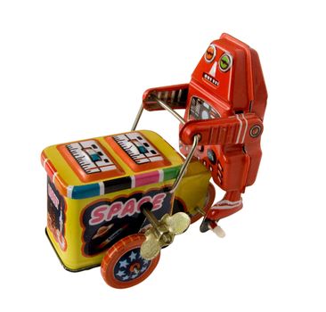 vintage metal robot toy on a three wheeler