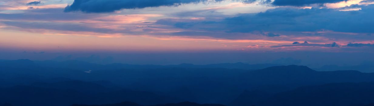 Panorama of sunset in mountains. Munnar, Kerala, India