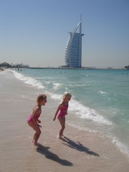 girls playing on the beach of Dubai