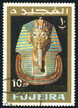 FUJEIRA - CIRCA 1966: stamp printed by Fujeira, shows golden mask of egyptian pharaoh, circa 1966