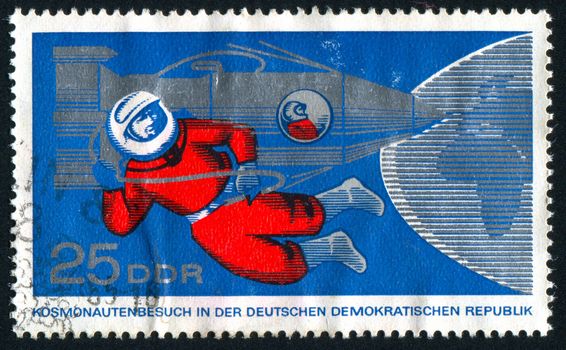 GERMANY - CIRCA 1965: stamp printed by Germany, shows onov floating in space, circa 1965