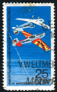 GERMANY - CIRCA 1968: stamp printed by Germany, shows �Trener� Stunt Plane, circa 1968