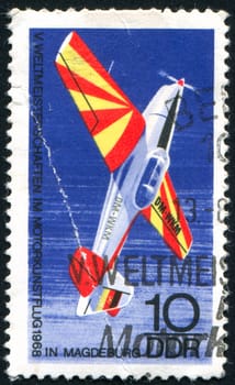 GERMANY - CIRCA 1968: stamp printed by Germany, shows �Trener� Stunt Plane, circa 1968