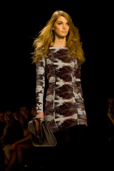 NEW YORK, NY - FEBRUARY 11: A model walks the runway at the Rebecca Minkoff Fall 2011 fashion show during Mercedes-Benz Fashion week at The Theatre at Lincoln Center on February 11, 2011 in New York City. (Photo by Diana Beato)