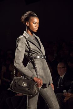 NEW-YORK, NY - FEBRUARY 11: A model walks the runway during the Nicole Miller Ready to Wear Fall/Winter 2011/2012 show at Mercedes-Benz New York Fashion Week on February 11, 2011 in New York, New York. (Photo by Diana Beato)