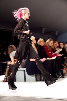 NEW YORK, NY - FEBRUARY 12: A model walks the runway at the Charlotte Ronson Fall 2011 fashion show during Mercedes-Benz Fashion Week at Lincoln Center on February 12, 2011 in New York City. (Photo by Diana Beato)