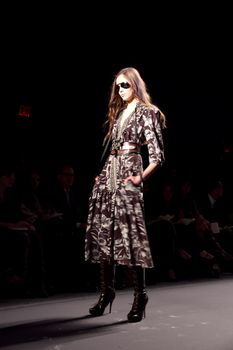 NEW YORK, NY - FEBRUARY 14: A model walks the runway at the Tracy Reese Fall 2011 fashion show during Mercedes-Benz Fashion Week at The Studio at Lincoln Center on February 14, 2011 in New York City. (Photo by Diana Beato)