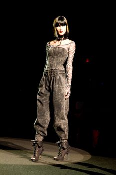 NEW YORK, NY - FEBRUARY 14: A model walks the runway at the Betsey Johnson Fall 2011 fashion show during Mercedes-Benz Fashion Week at The Theatre at Lincoln Center on February 14, 2011 in New York City. (Photo by Diana Beato)