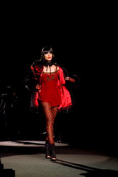 NEW YORK, NY - FEBRUARY 14: A model walks the runway at the Betsey Johnson Fall 2011 fashion show during Mercedes-Benz Fashion Week at The Theatre at Lincoln Center on February 14, 2011 in New York City. (Photo by Diana Beato)