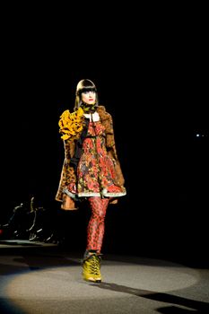 NEW YORK, NY - FEBRUARY 14: A model walks the runway at the Betsey Johnson Fall 2011 fashion show during Mercedes-Benz Fashion Week at The Theatre at Lincoln Center on February 14, 2011 in New York City. (Photo by Diana Beato)