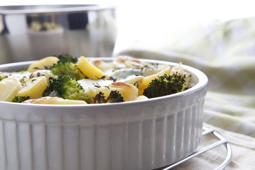 Vegetarian casserole with potatoes, broccoli and mozzarella cheese.