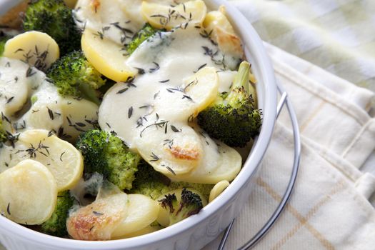 Vegetarian casserole with potatoes, broccoli and mozzarella cheese.