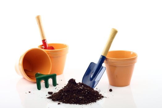 Set of gardening tools and pots