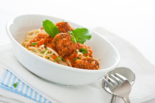 Original Italian spaghetti with meatballs in tomato sauce