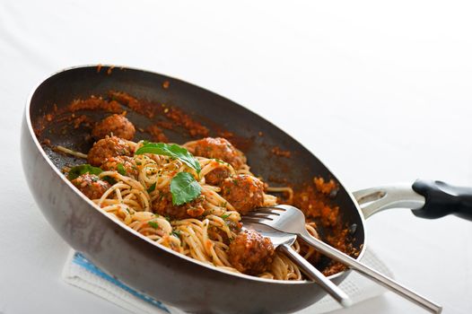 Original Italian spaghetti with meatballs in tomato sauce