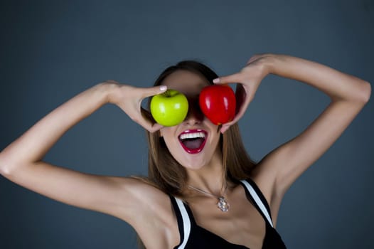 Portrait of model with apples in hands