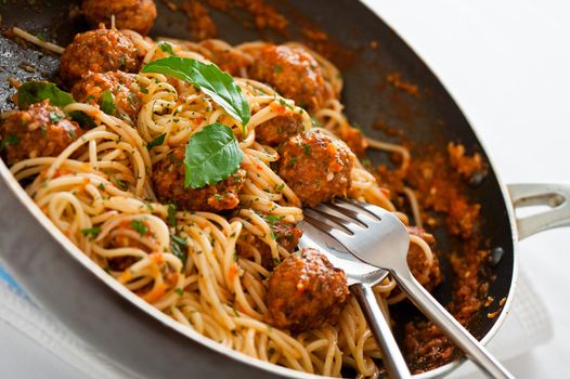 Original Italian spaghetti with meatballs in tomato sauce