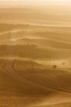 Ground mist along road and fields