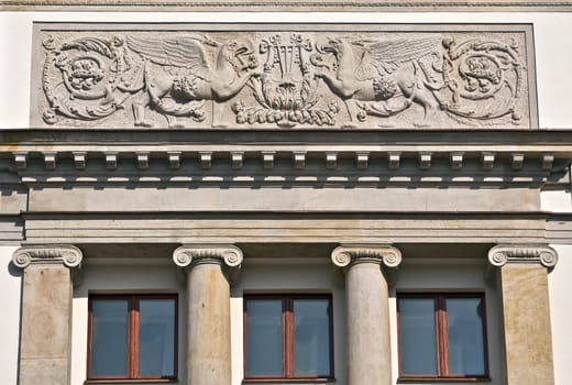 Warsaw building facade, detail of polish architecture.