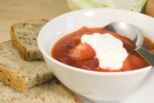 Vegetable soup - borscht in bowl with bread