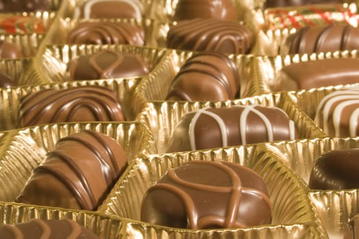 Chocolate candies in a golden box
