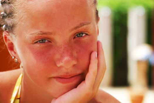 Portrait of smiling girl with freckles