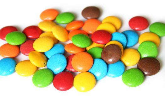 Colorful candies on white background