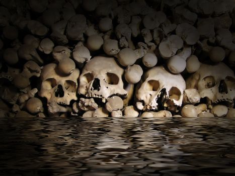 Skulls and bones from charnel-house in the water