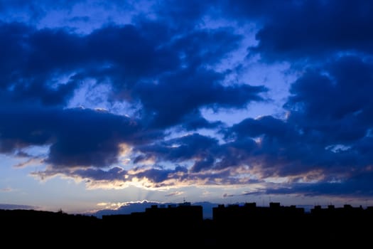 Sunrise in the city - sky above panel houses