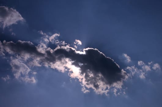 The sun is hidden behind the clouds